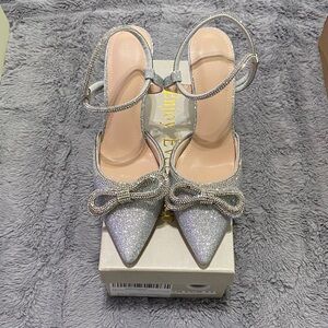 Elegant Silver Glitter Heels with Bow Accent